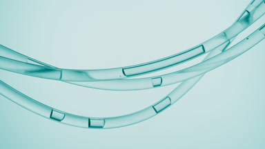 Cyan liquid is flowing in three transparent lab connecting tubes