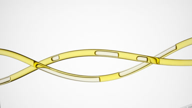 Sunflower oil is flowing in two twisted lab connecting tubes