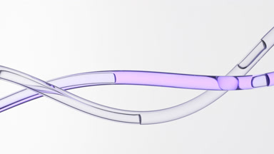 Purple oil and colorless fluid flowing in two connecting tubes
