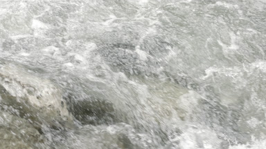 Mountain river water bubbling and foaming