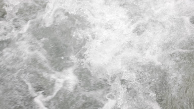 Mountain river water bubbling and foaming