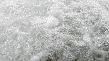 Mountain river water bubbling and foaming