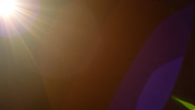 Warm light leak diagonal spot ghosting and veiling flares