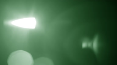 Green prism flare light leak moves sideways