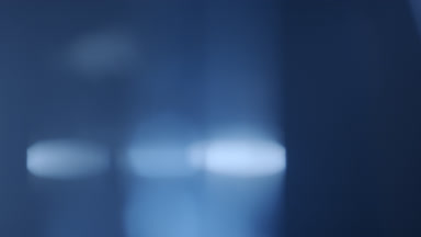 Cool prism flare spot rises vertically in overlay