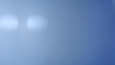Cool light leak veiling flare rises vertically