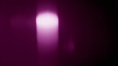 Pink light leak overlay bright spot shifts top to bottom