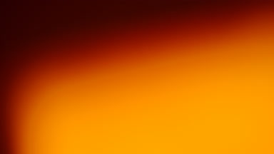 Warm light leak burn wipe upward transition overlay