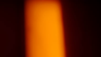Warm light leak overlay vertical band moves center right