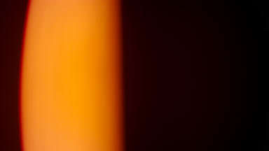 Warm tint light leak overlay vertical band left side