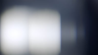 Neutral organic light leak overlay moving upwards