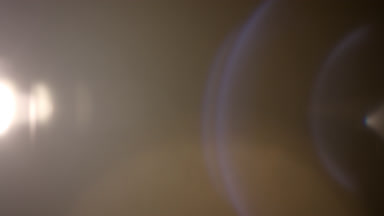 Neutral light leak overlay with horizontal prism flares