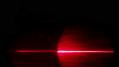 Red laser light leak flashing bottom edge transition