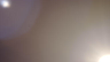 Neutral light leak overlay spot moves right to left flares