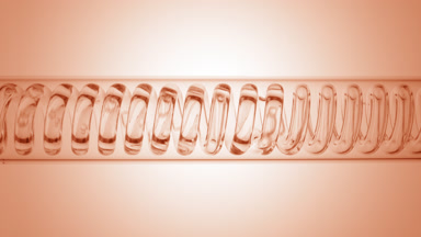 Clear liquid in horizontal coil condenser on beige ramp fill
