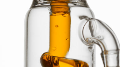 Honey water in glass tube, bubbles condense and move chaotically