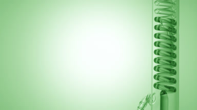 Green liquid fills vertical coil condenser, right, green ramp