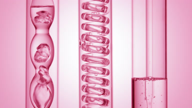 Liquid with bubbles in bulb and coil condensers, pink ramp