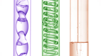 Violet, green, beige liquids bubble in bulb condenser, white bg