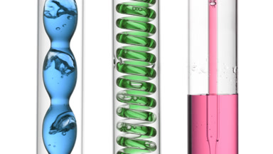 Blue, green, pink bubbling in condenser, filling tube on white