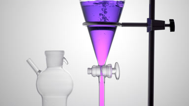 Blueberry extract pours in funnel, bubbles rising underwater
