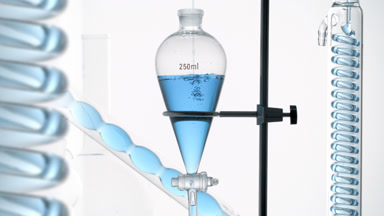 Hyaluronic acid pours into funnel, bubbles, fills condenser