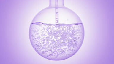 Clear liquid dropper injection swirls in flask, purple ramp base