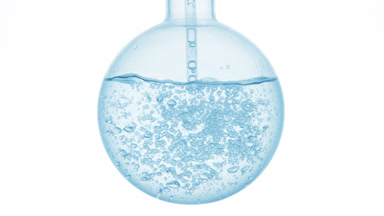 Ethoxydiglycol dropper injection swirls and bubbles in flask