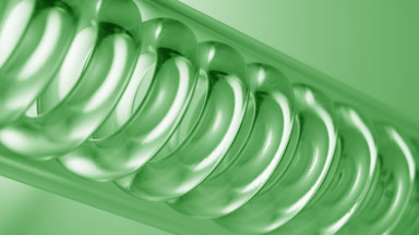 Isopropyl alcohol flows through spiral coil lab condenser