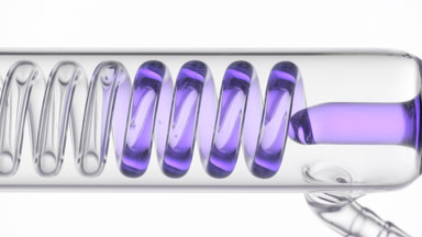 Hyaluronic acid fills coil condenser visible in glass tube flow