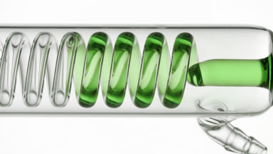 Fragrance fills horizontal coil condenser in glass tubing