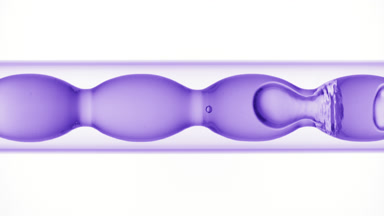 Butterfly pea flower tincture fills and drains bulb condenser