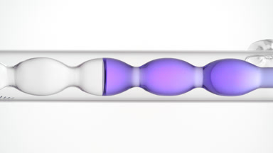 Violet liquid fills and drains vertically in bulb condenser