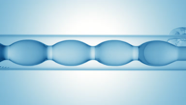 Blue liquid fills and drains from bulb condenser, blue ramp