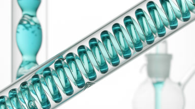 Copper gluconate bubbling through lab coil, bulb condenser