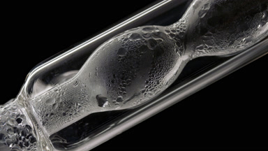 Distilled water condensing on bulb lab condenser walls