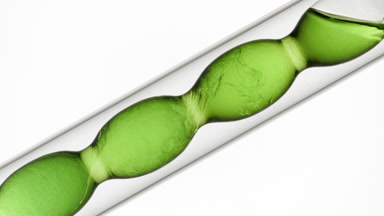 Aloe vera juice mixed in flask, refractive swirls & schlieren