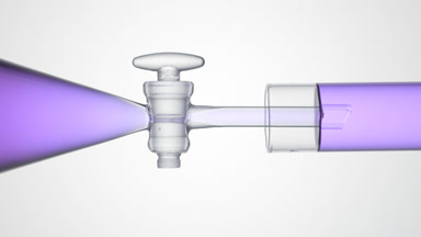Purple basil hydrosol flows from funnel into test tube, filling