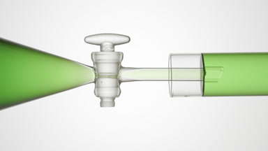 Peppermint hydrosol flows from funnel into test tube, filling