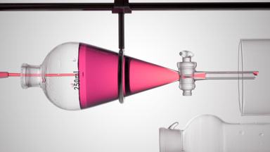 Strawberry distillate poured into separatory funnel, extraction