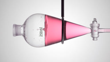 Niacinamide poured in funnel, bubbles form and rise underwater