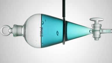 Cyan liquid drains from funnel, rising bubbles on light grey