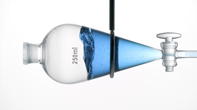 Copper sulfate solution injected into funnel liquid splash form