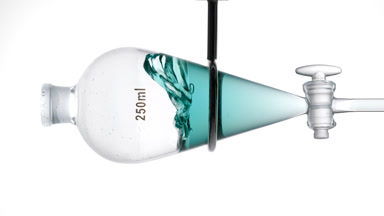 Fragrance splashing in separatory funnel, dynamic liquid effect