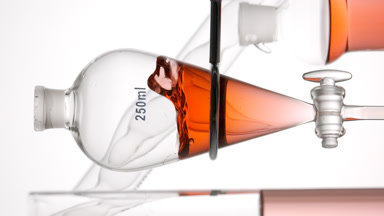 Orange transparent liquid injected, waves form on white