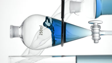 Blue liquid injected, creating gentle waves on white background