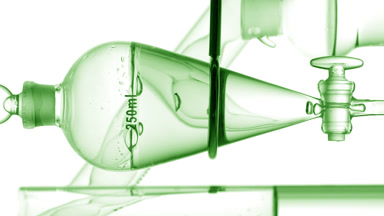 Lotion drains from funnel, bubbles rising inside during process