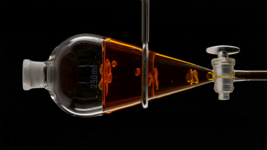 Sea buckthorn extract in vessel, causing bubbles to rise inside