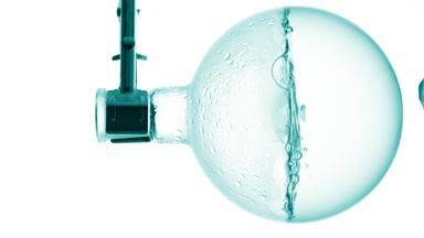 Urea solution boiling in round-bottom flask, condensation