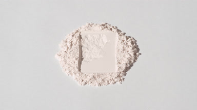 Sweeping Shot of Light Beige Powder with Rectangular Mark